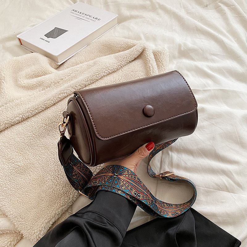New bag with slanted body for women niche spring and summer fashion designer multifunctional cylindrical bag retro high-end solid color single shoulde