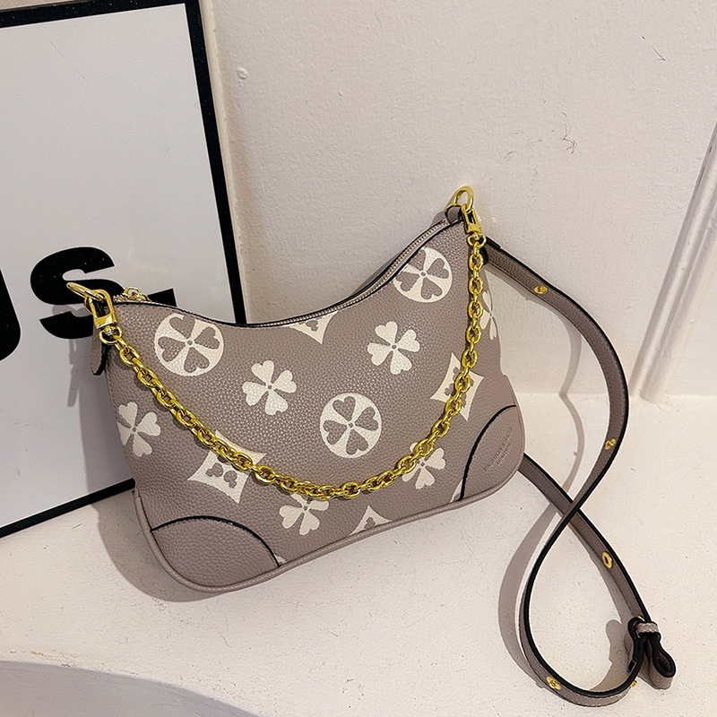 Female new litchi emed croissant French chain armpit high appearance level female bag 2025
