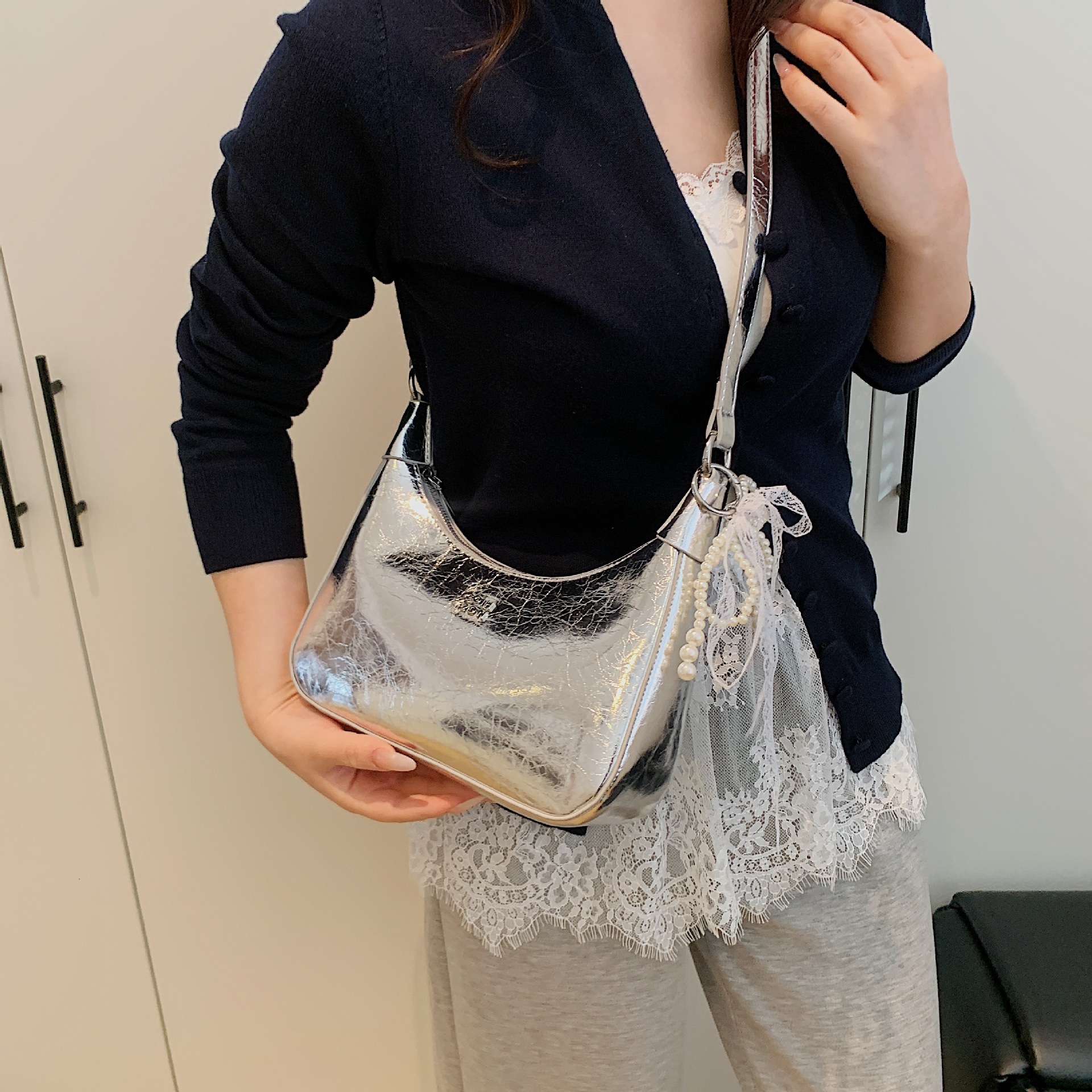 2025S designer high-end sense niche women new trendy summer style shoulder wrinkled texture underarm bag