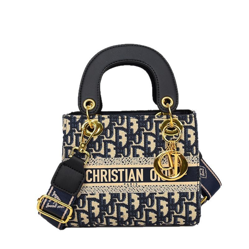 The new women's handbag is simple and fashionable, with a large capacity and exquisite embroidery. It is a portable handbag for women and a cross
