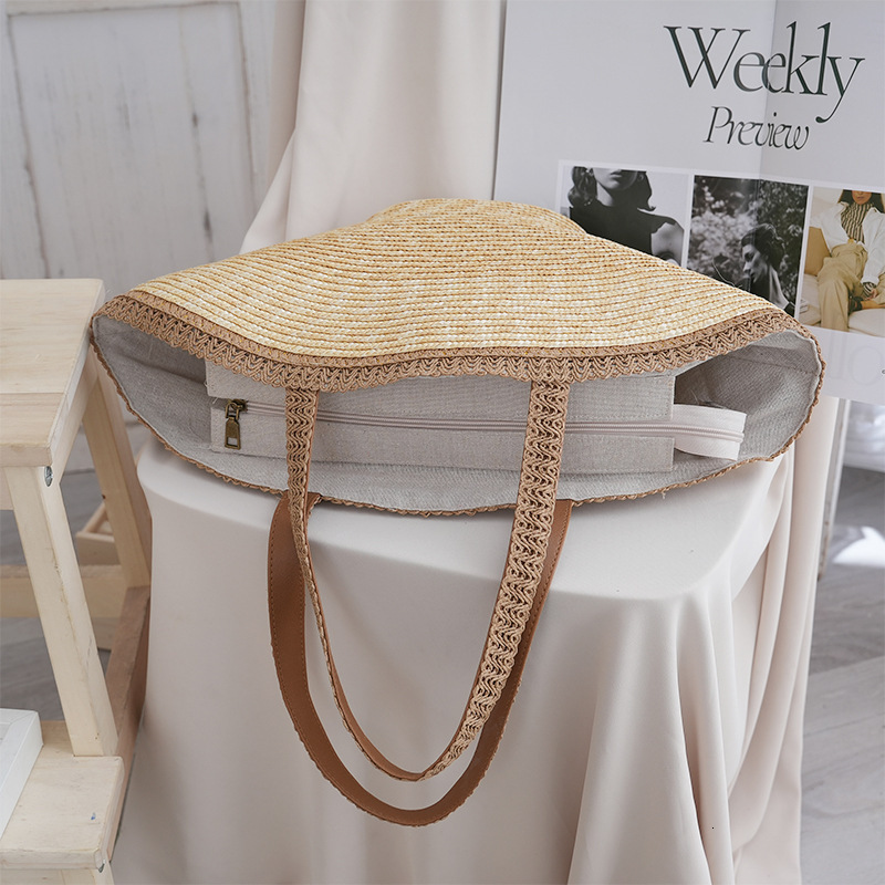 2025S designer new handmade niche fresh handbag hat grass woven vacation style beach versatile women bag
