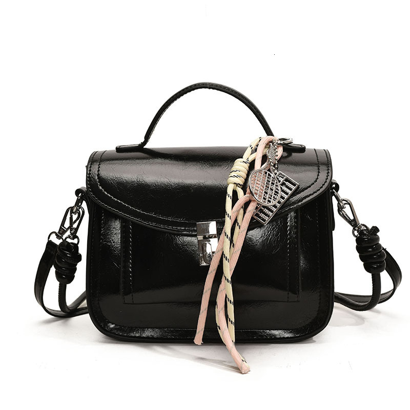 2025 Women's Lock Shoulder Cross Bag Free Shipping Designer Korean Edition Multi Functional Postman Handheld Small Square Bag Simple Leisure Comm