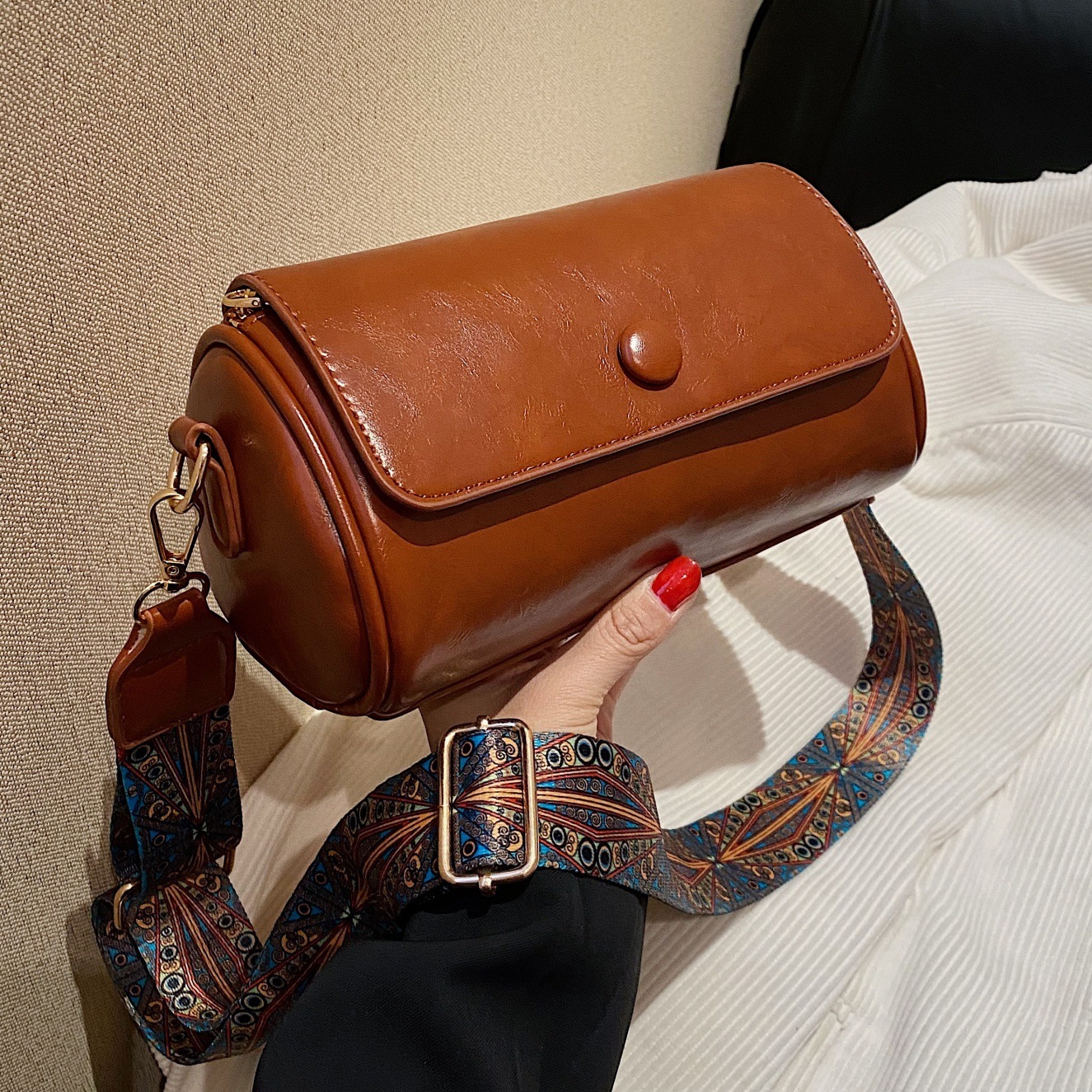 New bag with slanted body for women niche spring and summer fashion designer multifunctional cylindrical bag retro high-end solid color single shoulde