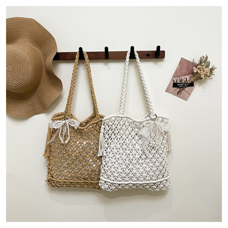 2025S designer large capacity hollow hand women summer new vacation beach shoulder leisure water bucket straw woven bag small square bag
