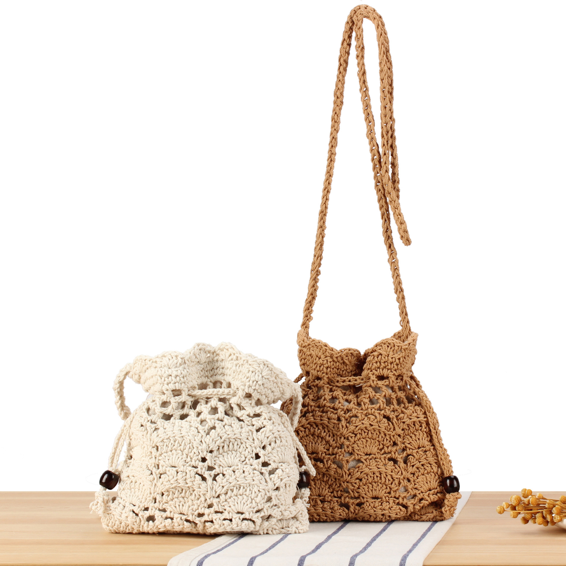2025S designer new handmade woven cotton rope daily casual shoulder versatile commuting beach vacation niche women crossbody bag handbag