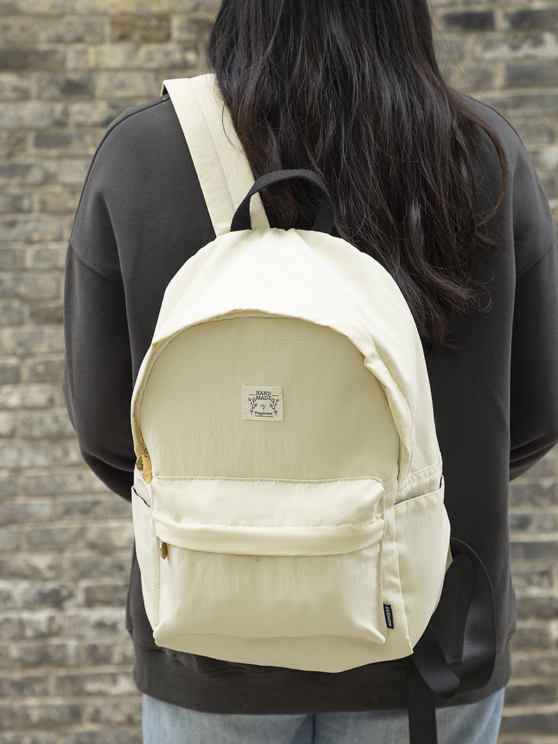 2025S designer bag with high aesthetic value solid color Instagram style backpack student girl travel trend lightweight small backpack