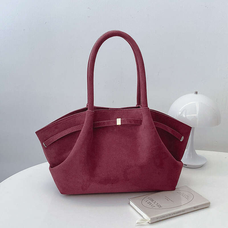 Design sense, large capacity, niche, high aesthetic handheld tote for women suede pleated underarm dumpling bag 2025 new style, unique and elegant tem