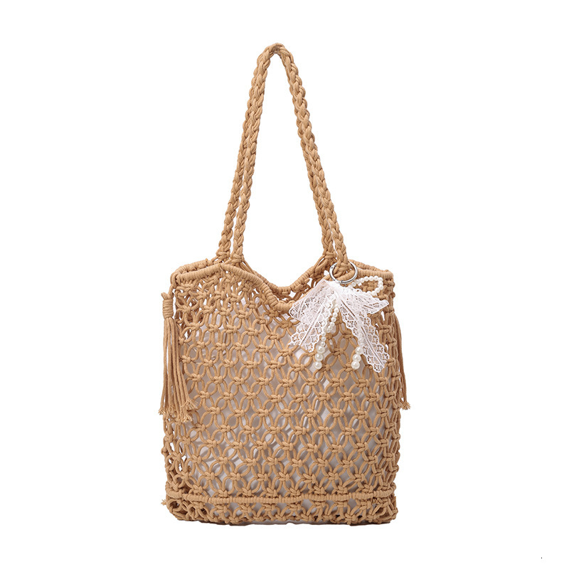 2025S designer large capacity hollow hand women summer new vacation beach shoulder leisure water bucket straw woven bag small square bag