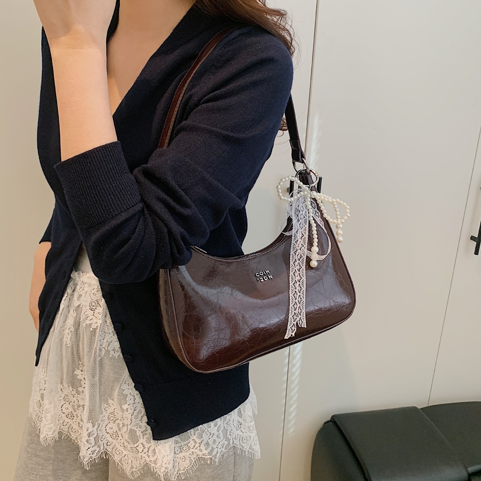 2025S designer high-end sense niche women new trendy summer style shoulder wrinkled texture underarm bag