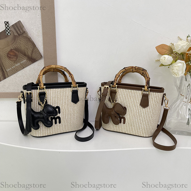 Free shipping 2025s designer bag summer vacation seaside Bag Messenger Bag NEW popular woven straw woven bag women's bag Bucket Bag Handbag casua