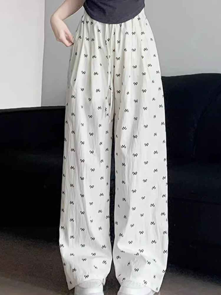 Summer Womens Korea Casual Elastic Waist RelaxedFit Pants 2025 Female Sweet Style Irregular Bow Print WideLeg 250506
