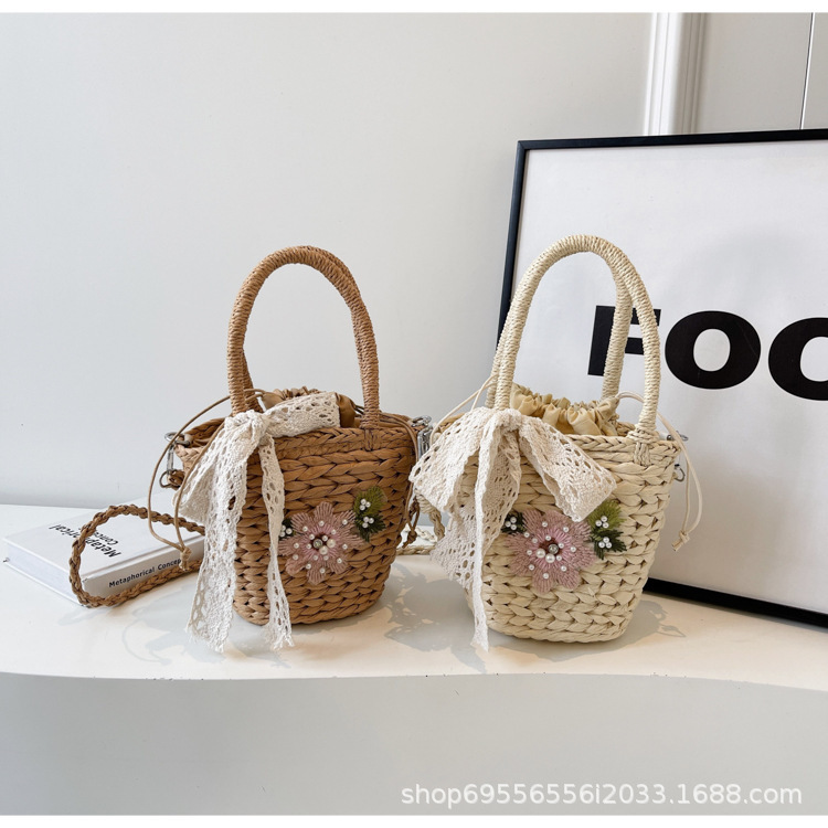 2025S designer women grass rattan new crossbody shoulder internet famous hand woven beach bucket bag