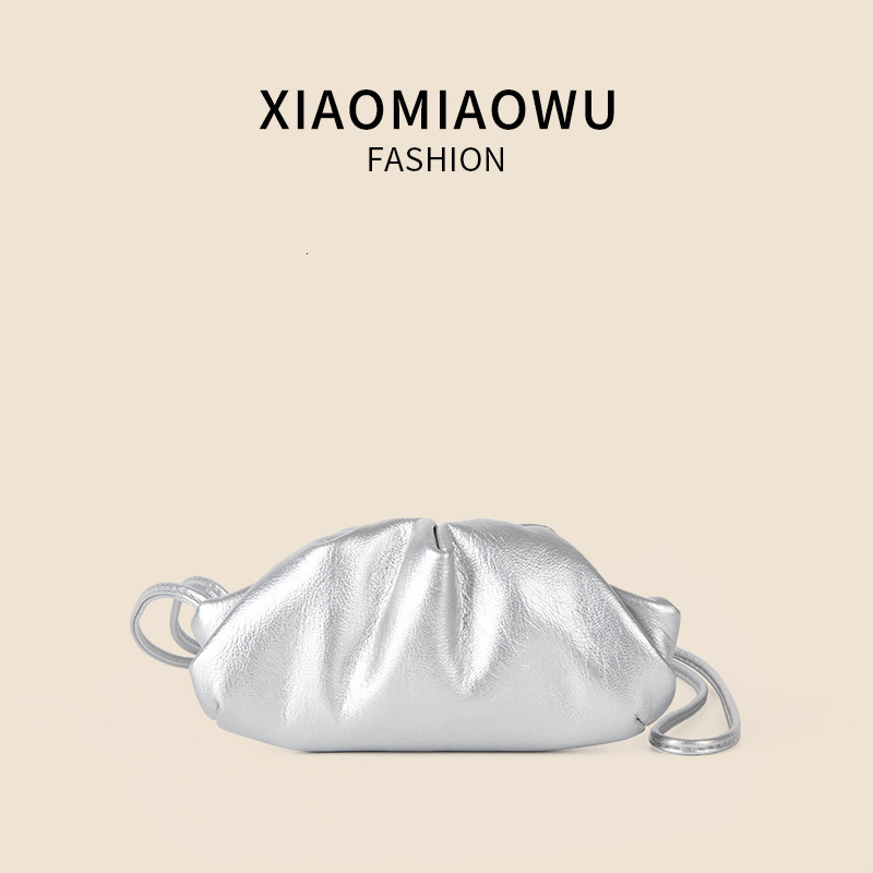 2025S designer new women oil wax leather hanging neck niche simple and melodious shoulder Korean commuting wrinkled mini dumpling bag