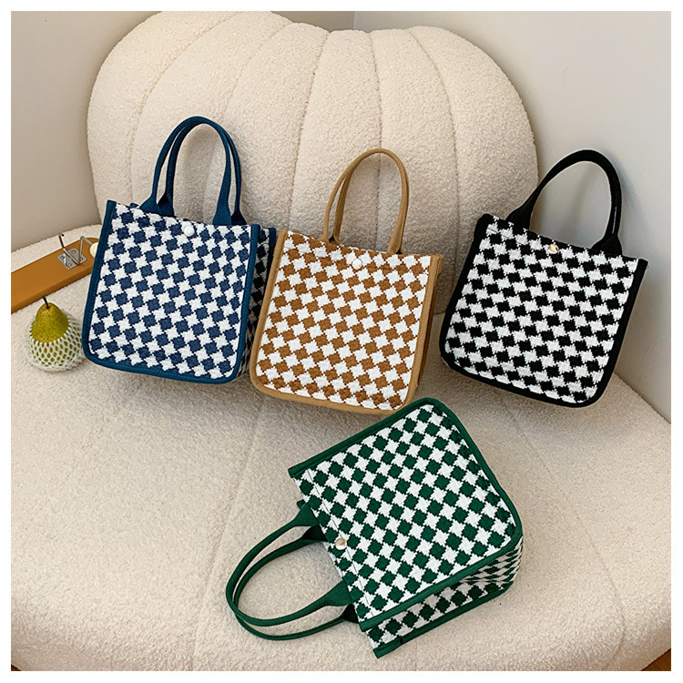 2025S designer new style outdoor women high-end sense niche tote bag work commuting handbag fashionable carrying strap