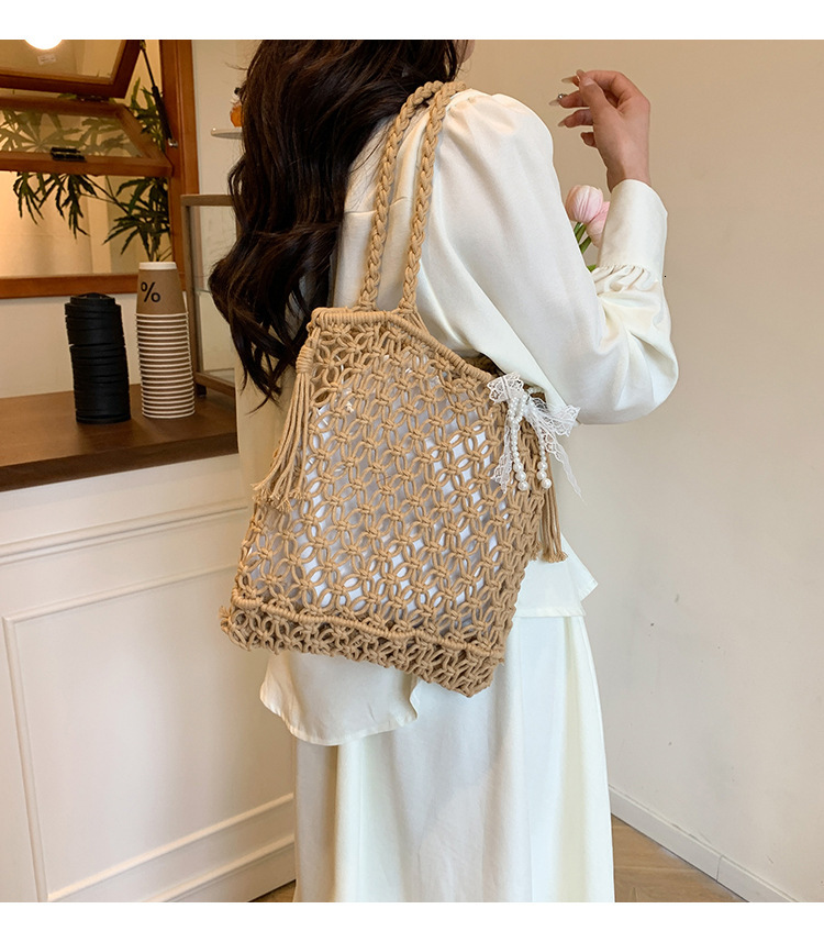 2025S designer large capacity hollow hand women summer new vacation beach shoulder leisure water bucket straw woven bag small square bag