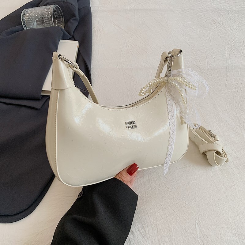 2025S designer high-end sense niche women new trendy summer style shoulder wrinkled texture underarm bag