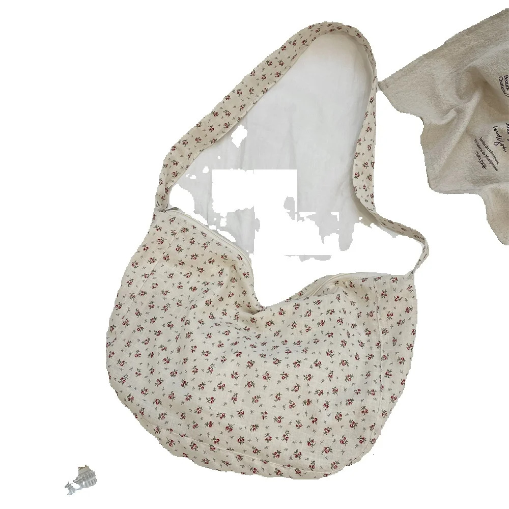 2025S designer casual big women summer new item floral canvas large capacity class commuting shoulder bag crossbody bag