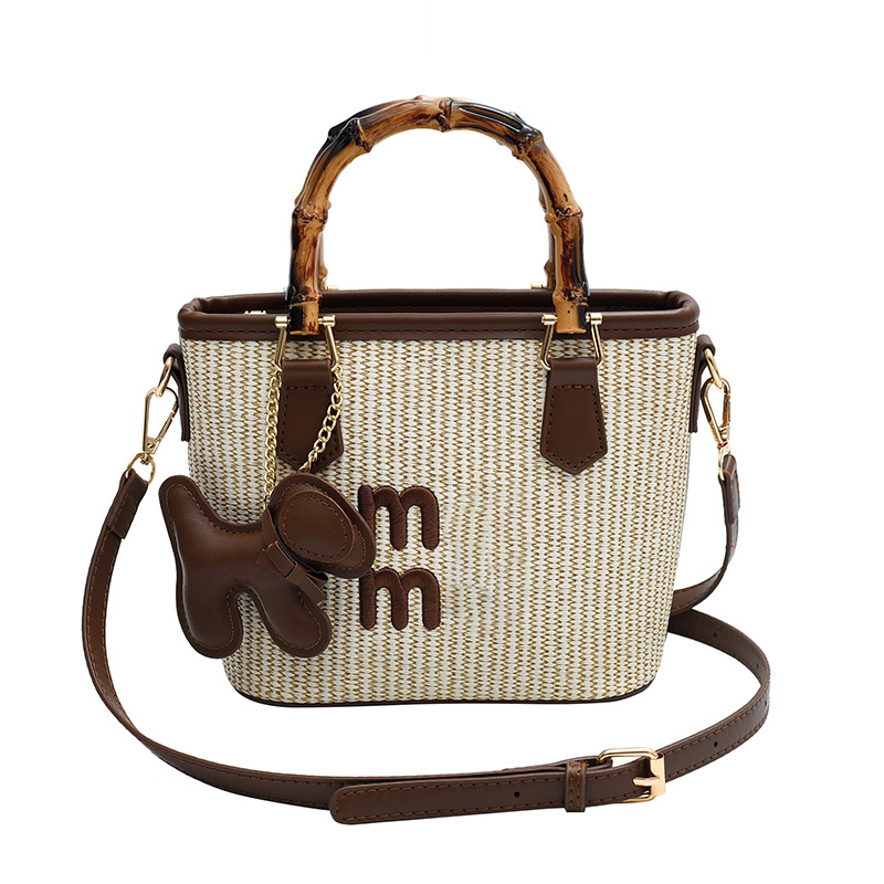 Free shipping 2025 designer bag new spring basket bag fashion contrast straw woven bag bamboo vegetable Bucket Bag Handbag single shoulder bag straddl