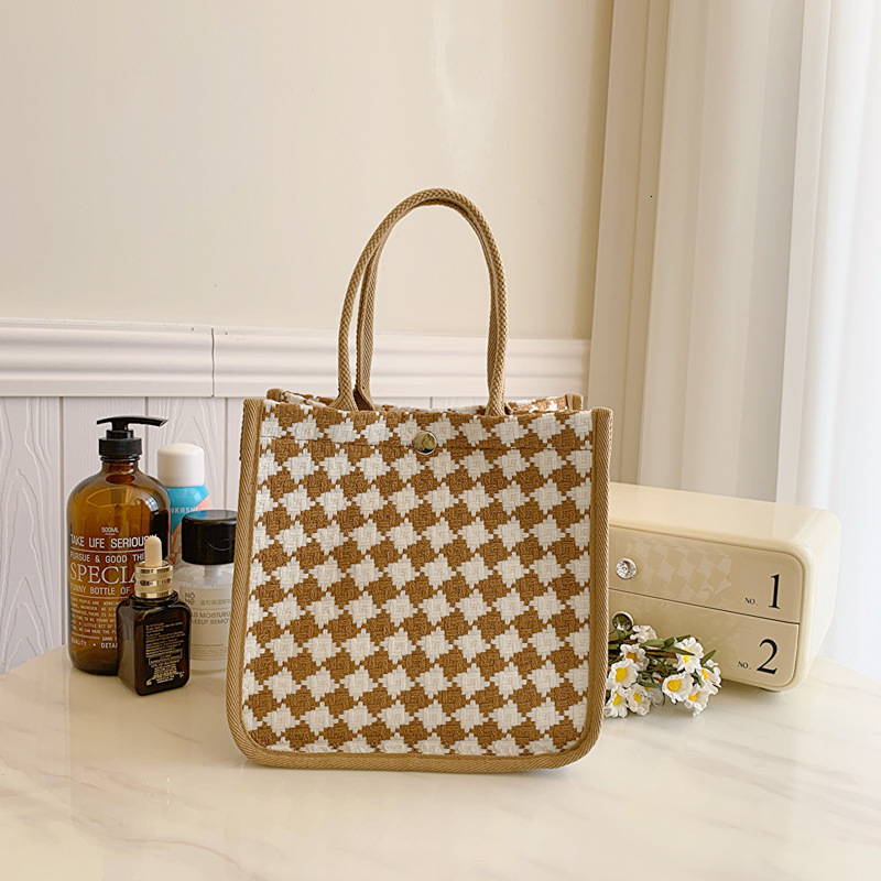 2025S designer new style outdoor women high-end sense niche tote bag work commuting handbag fashionable carrying strap