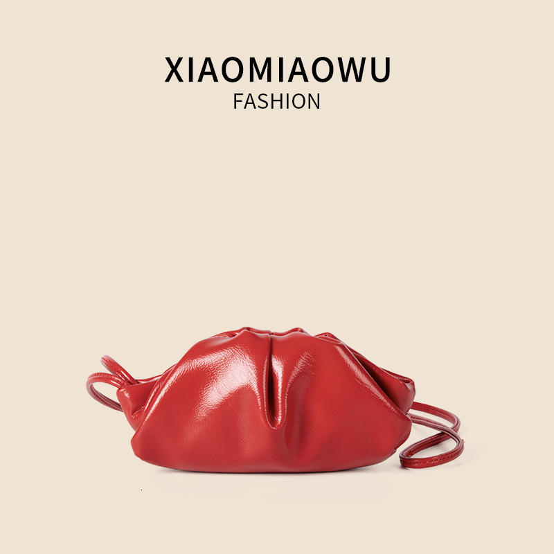 2025S designer new women oil wax leather hanging neck niche simple and melodious shoulder Korean commuting wrinkled mini dumpling bag