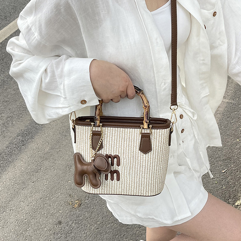 Free shipping 2025 designer bag new spring basket bag fashion contrast straw woven bag bamboo vegetable Bucket Bag Handbag single shoulder bag straddl