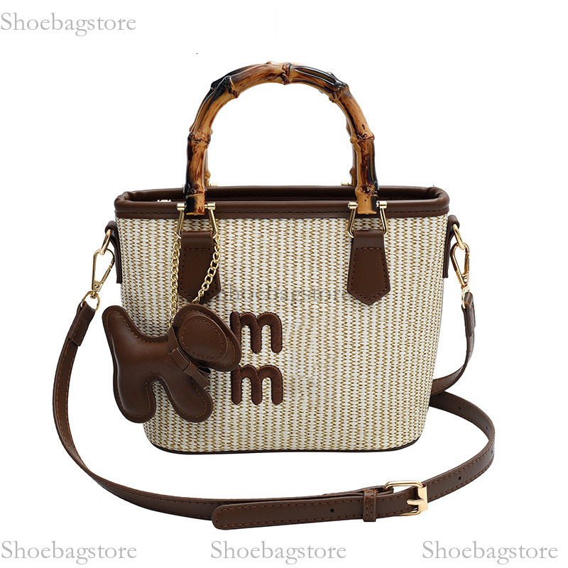 Free shipping 2025s designer bag summer vacation seaside Bag Messenger Bag NEW popular woven straw woven bag women's bag Bucket Bag Handbag casua