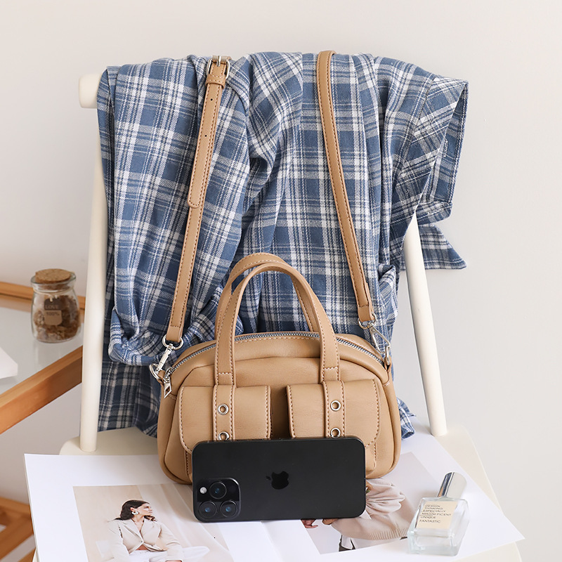 2025S designer Korean version casual handbag small square women versatile texture soft leather shoulder French stick niche simple crossbody bag