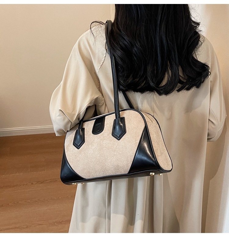 2025S designer women new high beauty splicing shoulder Boston bag versatile and niche pillow bag