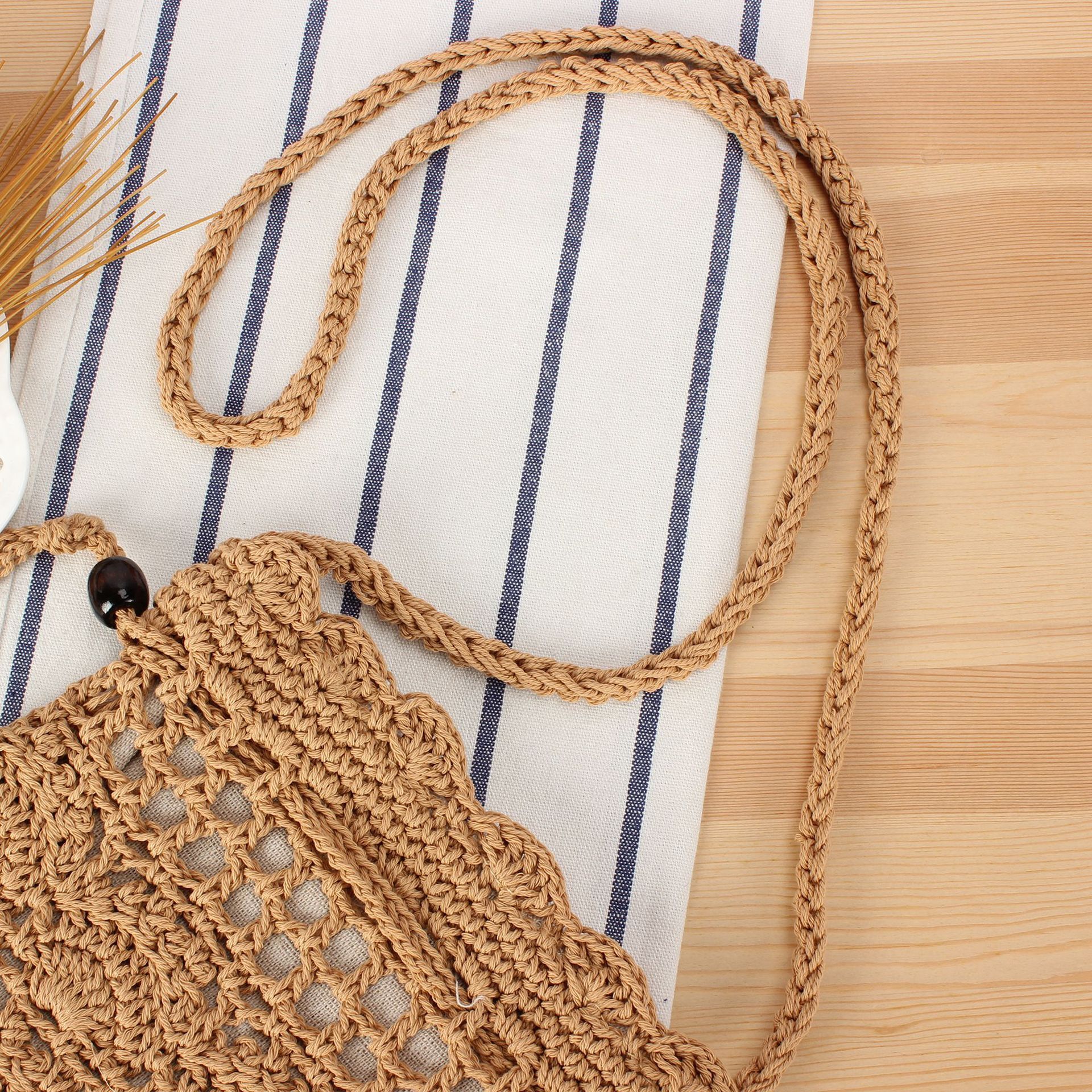 2025S designer new handmade woven cotton rope daily casual shoulder versatile commuting beach vacation niche women crossbody bag handbag