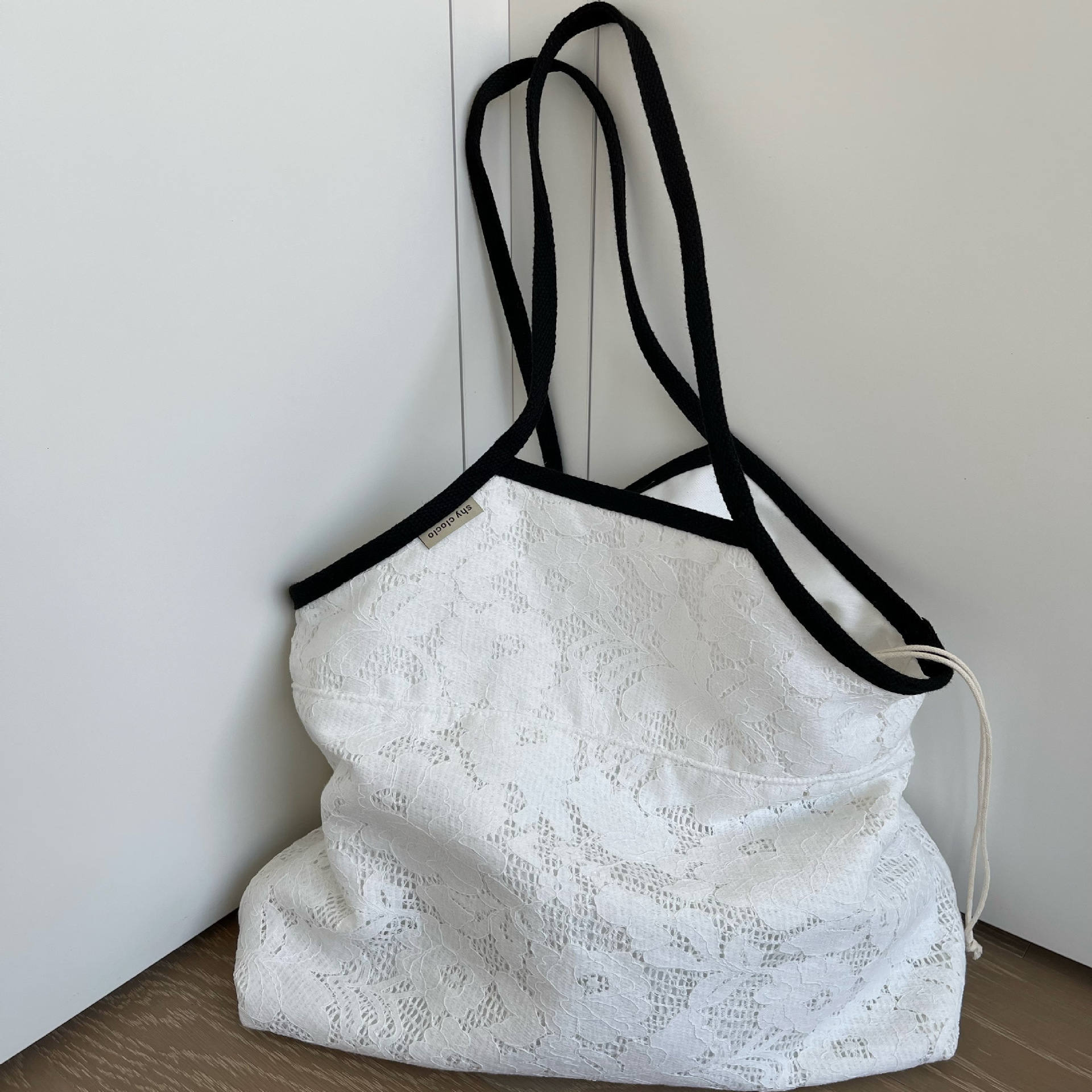 2025S designer new Korean high-end texture niche commuting white lace hollow canvas tote shoulder women bag