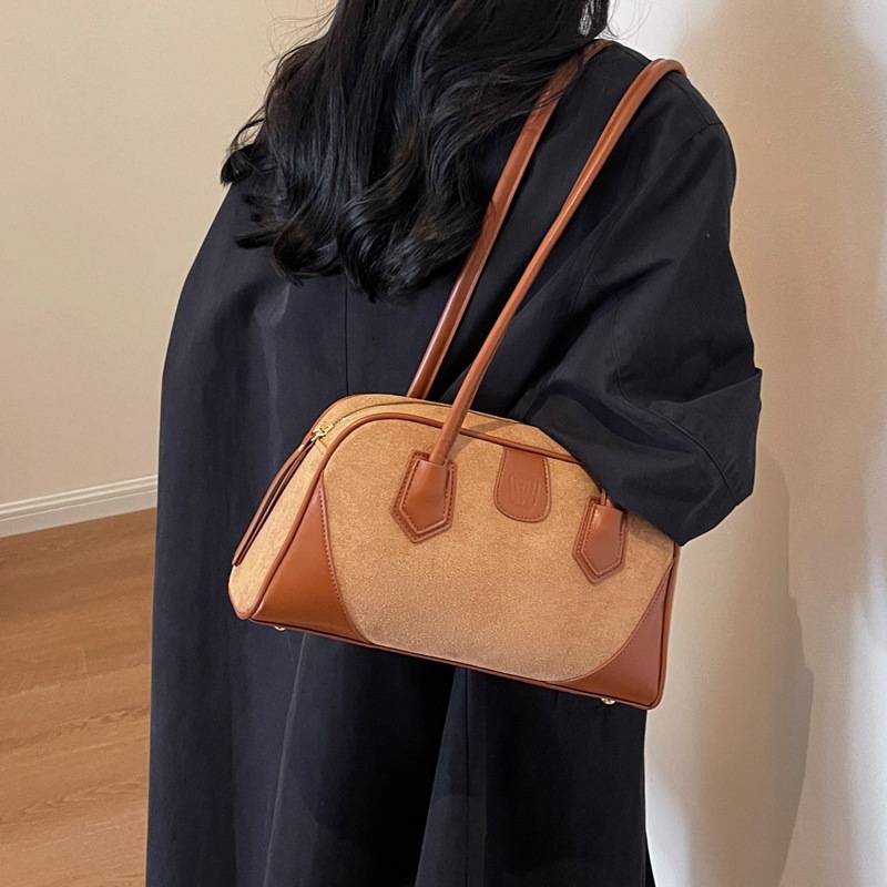 2025S designer women new high beauty splicing shoulder Boston bag versatile and niche pillow bag