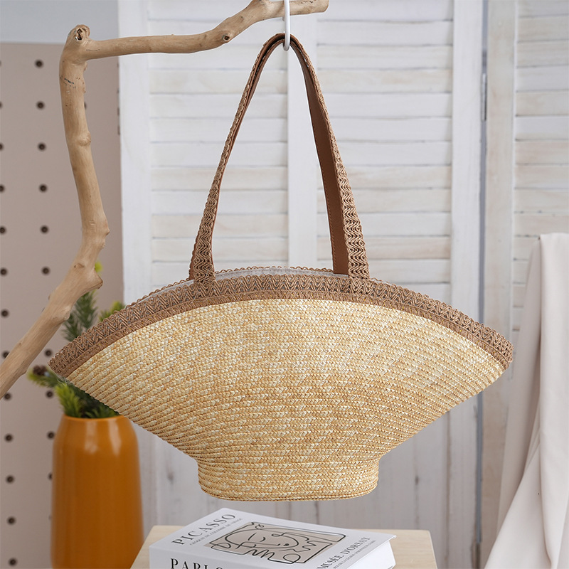 2025S designer new handmade niche fresh handbag hat grass woven vacation style beach versatile women bag