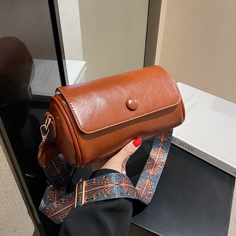 New bag with slanted body for women niche spring and summer fashion designer multifunctional cylindrical bag retro high-end solid color single shoulde