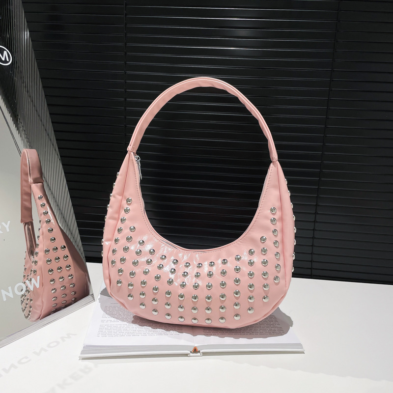 New punk style round rivet inlaid luxury bucket bag new women's underarm designer shoulder bag single shoulder crescent bag versatile commuting u