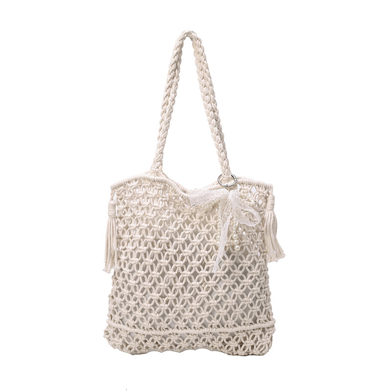 2025S designer large capacity hollow hand women summer new vacation beach shoulder leisure water bucket straw woven bag small square bag