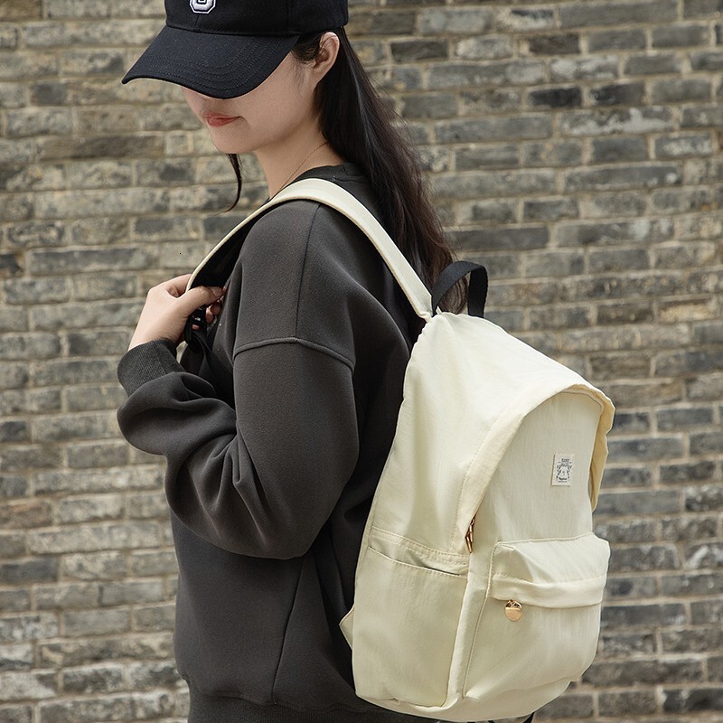 2025S designer bag with high aesthetic value solid color Instagram style backpack student girl travel trend lightweight small backpack