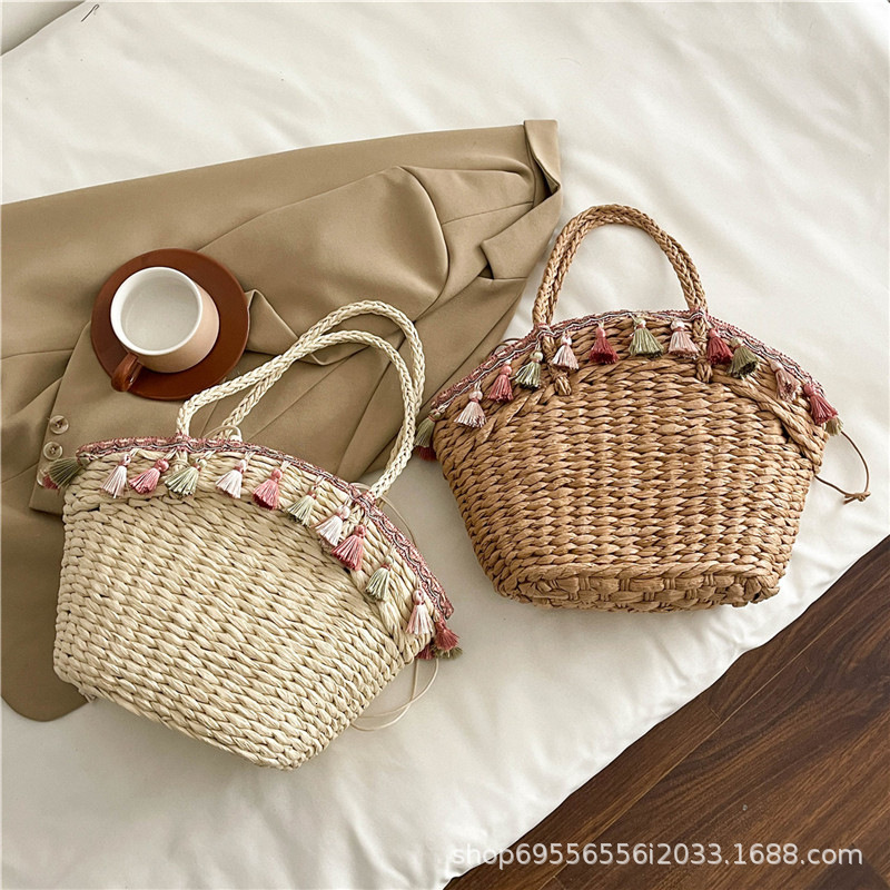 2025S Designer Straw Women New Fashionable and Versatile Large Capacity Bucket Beach Woven Handheld Vegetable Basket Bag