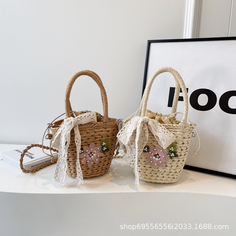 2025S designer women grass rattan new crossbody shoulder internet famous hand woven beach bucket bag