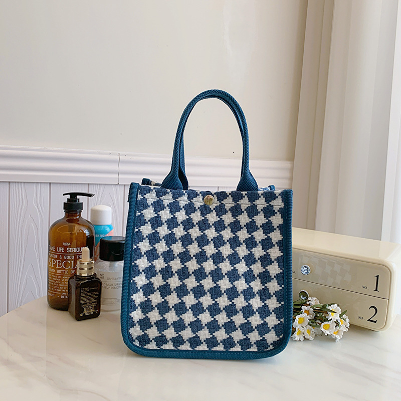 2025S designer new style outdoor women high-end sense niche tote bag work commuting handbag fashionable carrying strap