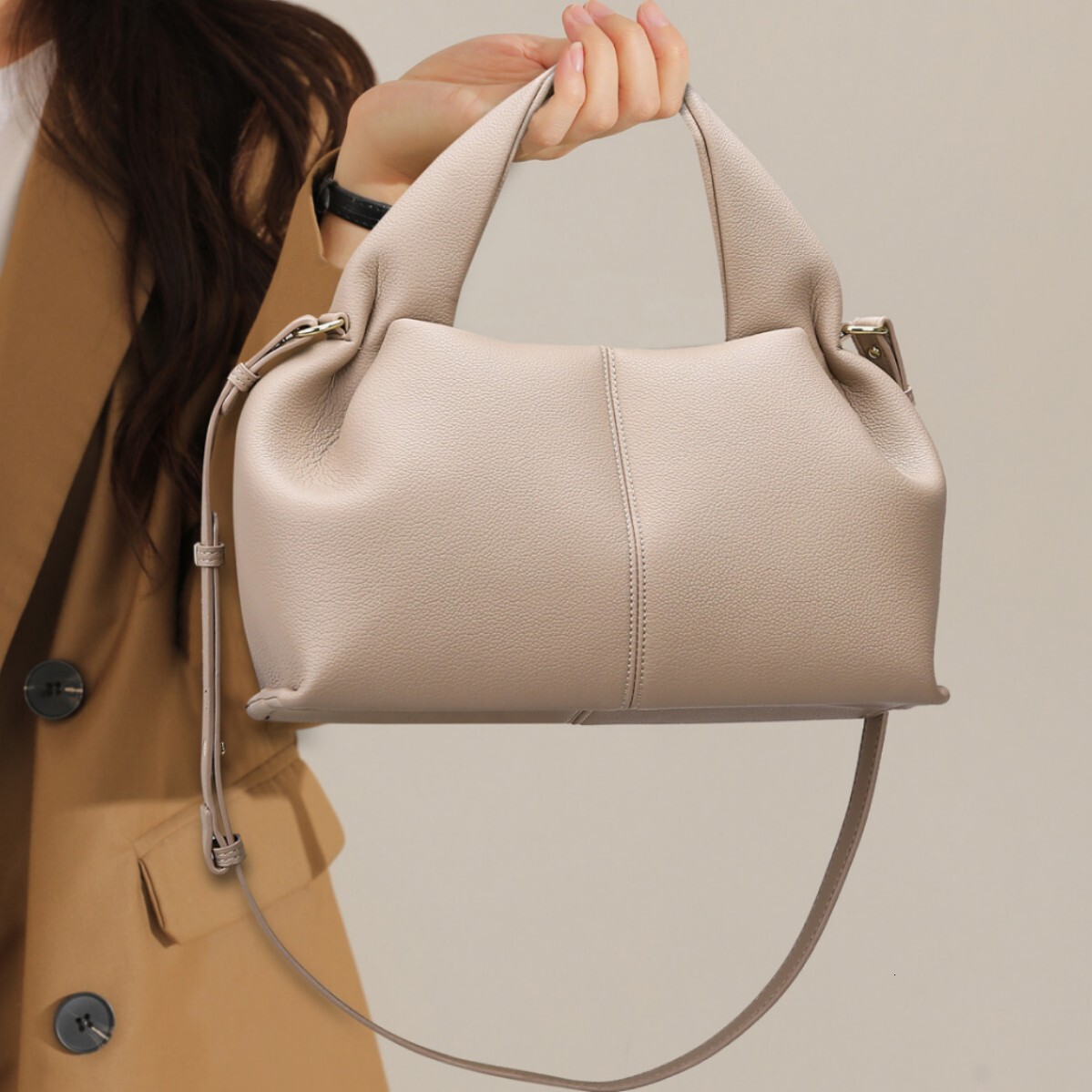 2025S designer niche cloud new versatile solid color dumpling fashion handbag shoulder women crossbody bag