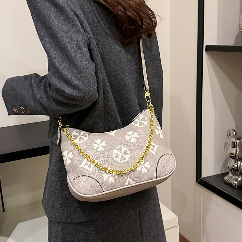 Female new litchi emed croissant French chain armpit high appearance level female bag 2025
