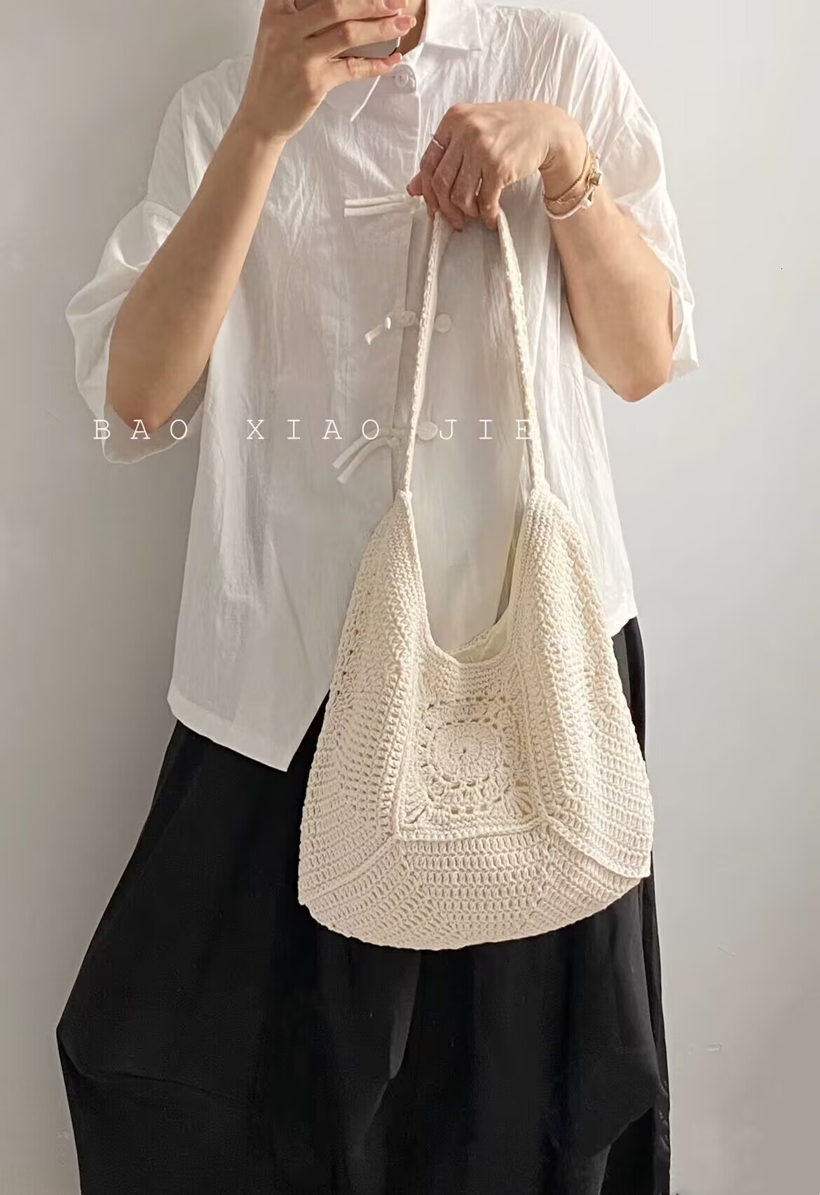 2025S designer high-end sense shoulder large capacity cotton thread new grandmother grid grass woven vacation beach versatile women bag