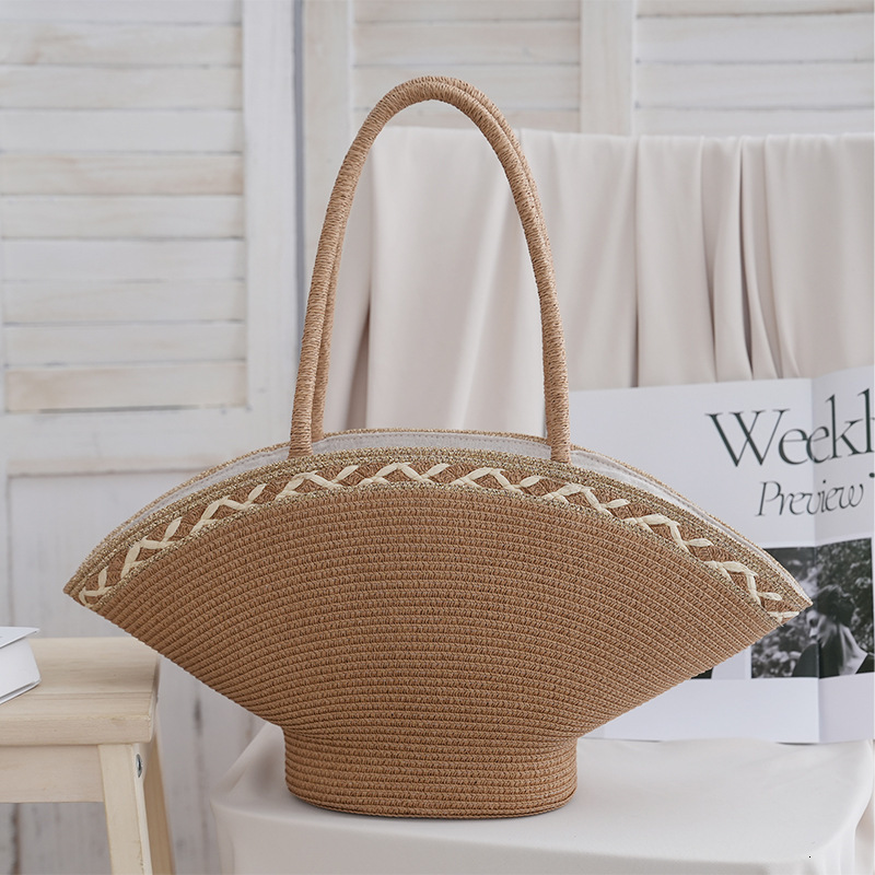 2025S designer new handmade niche fresh handbag hat grass woven vacation style beach versatile women bag