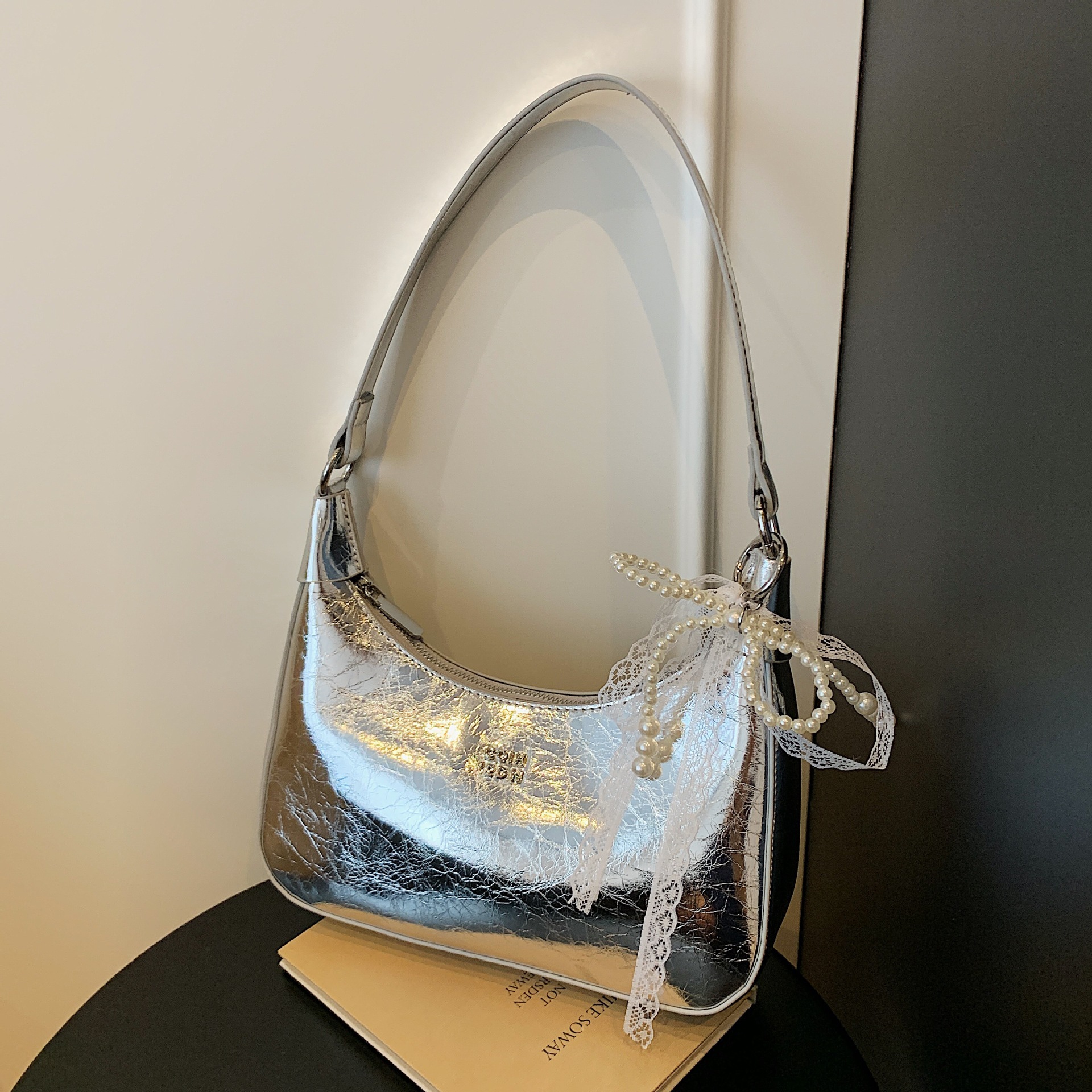 2025S designer high-end sense niche women new trendy summer style shoulder wrinkled texture underarm bag