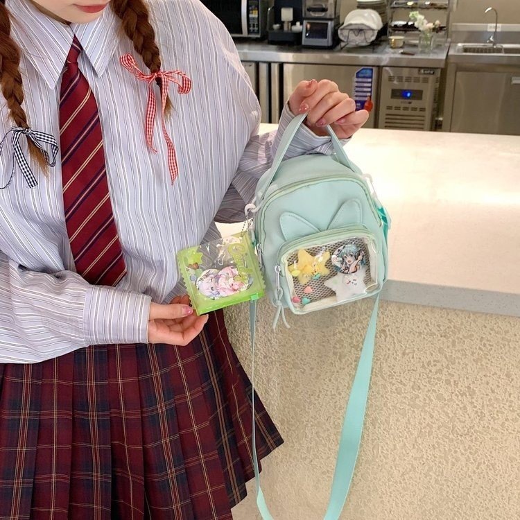 2025S Designer Pain Baby Cute anime Transparent Versatile Student Shoulder Crossbody Women Casual Cell Phone Small Square Bag