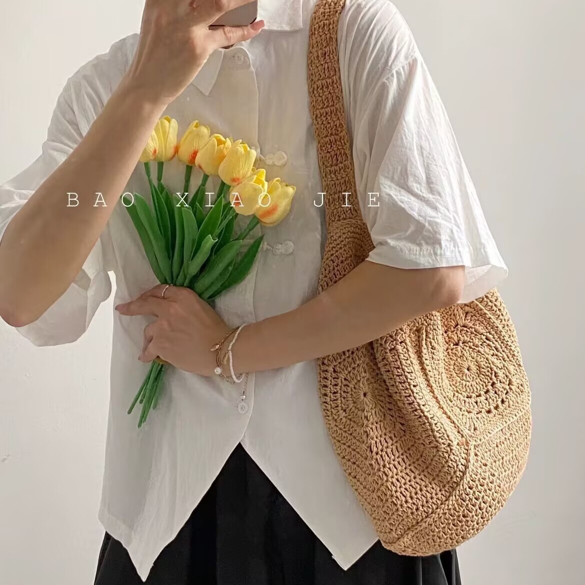 2025S designer high-end sense shoulder large capacity cotton thread new grandmother grid grass woven vacation beach versatile women bag