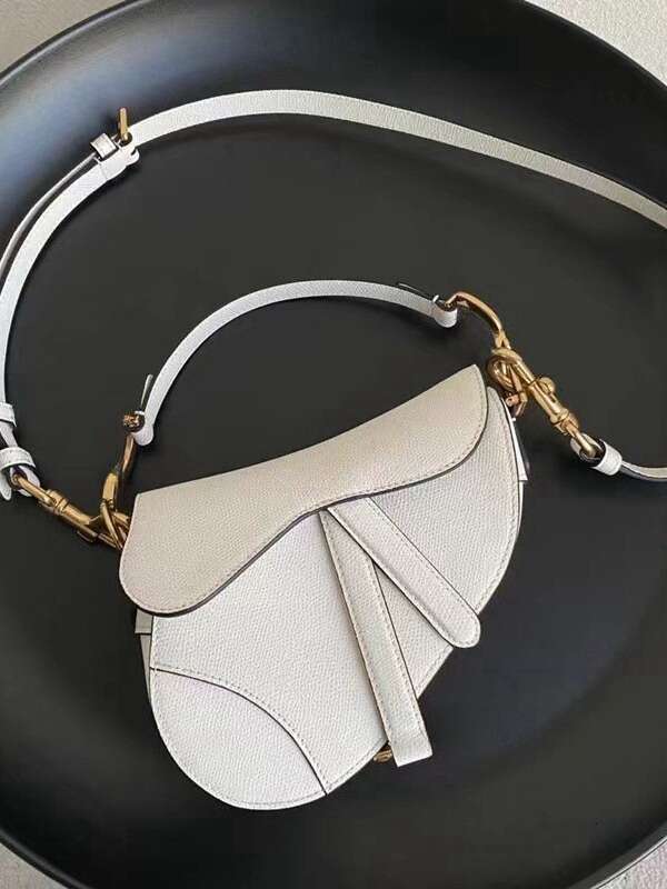 Guangzhou genuine leather denim handbag, armpit shoulder crossbody bag, vintage saddle bag