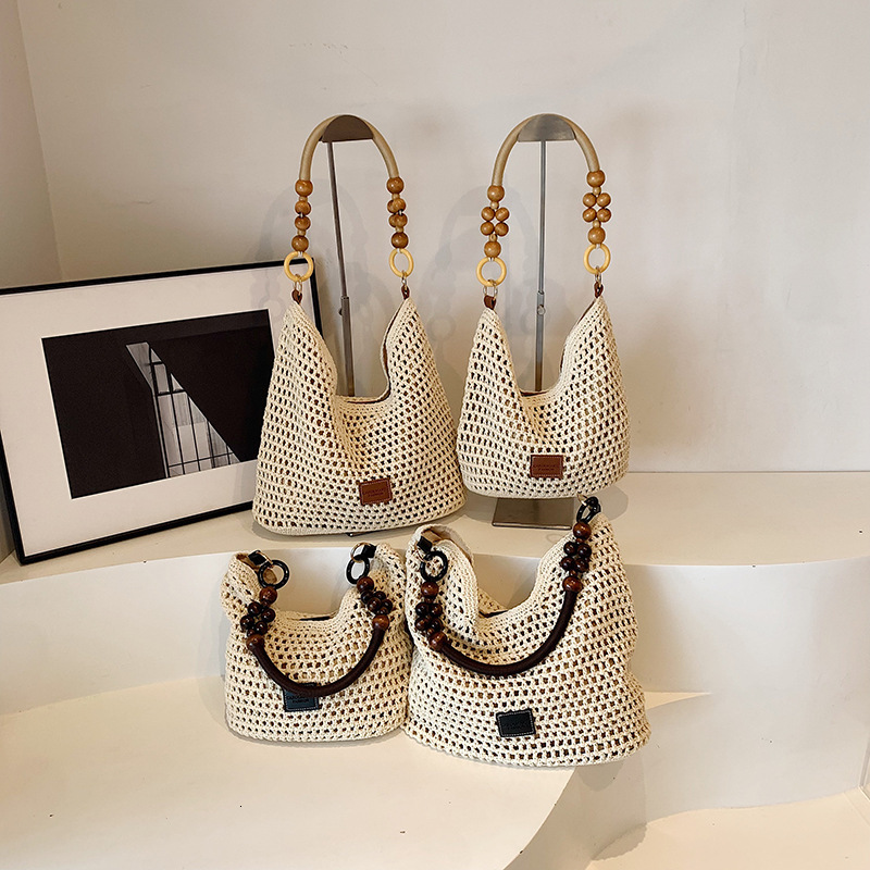 2025S designer beach vacation woven women new hollowed out knitted handbag large capacity shoulder bag armpit bag