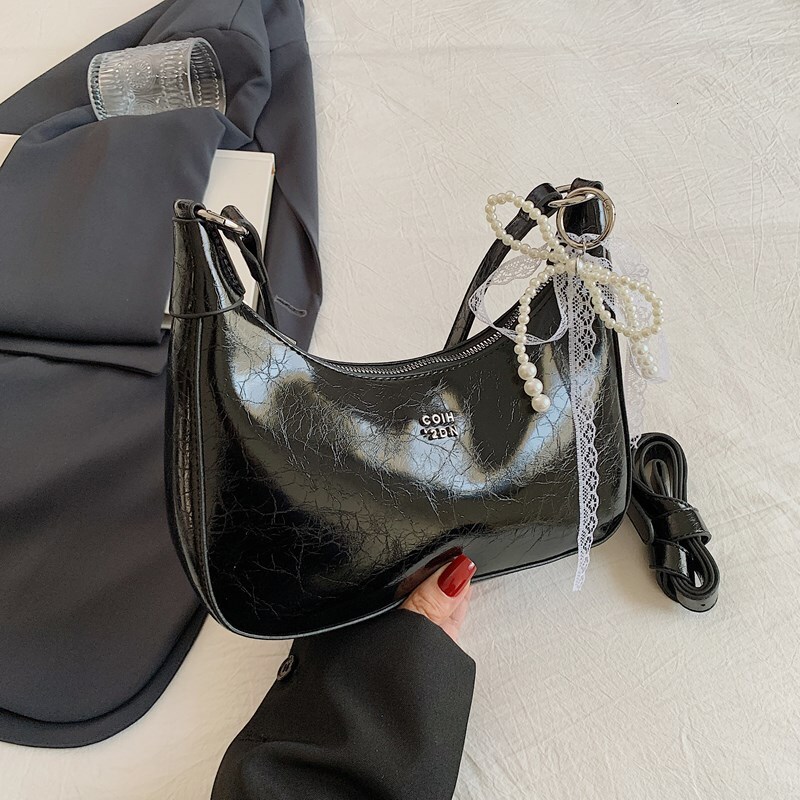2025S designer high-end sense niche women new trendy summer style shoulder wrinkled texture underarm bag