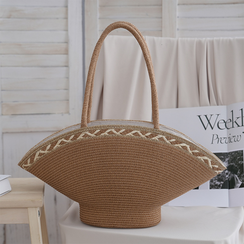 2025S designer new handmade niche fresh handbag hat grass woven vacation style beach versatile women bag